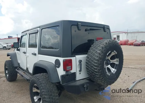 2011 Jeep Wrangler Unlimited Rubicon из США, поврежденный, VIN 1J4BA6H10BL536027